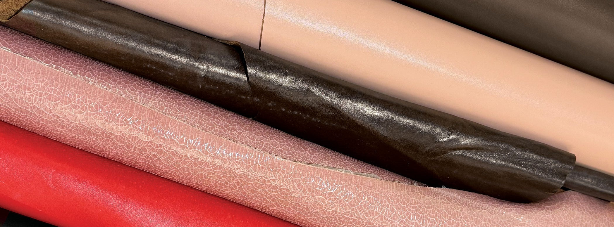 Close-up of various leather textures in different colors.